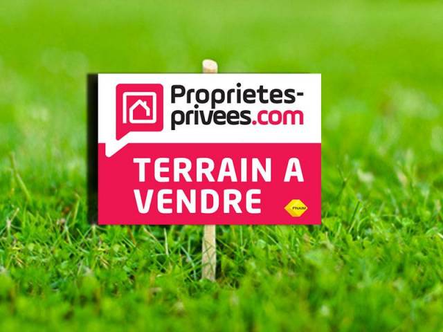 Terrain constructible de  1 400 m avec dpendance
